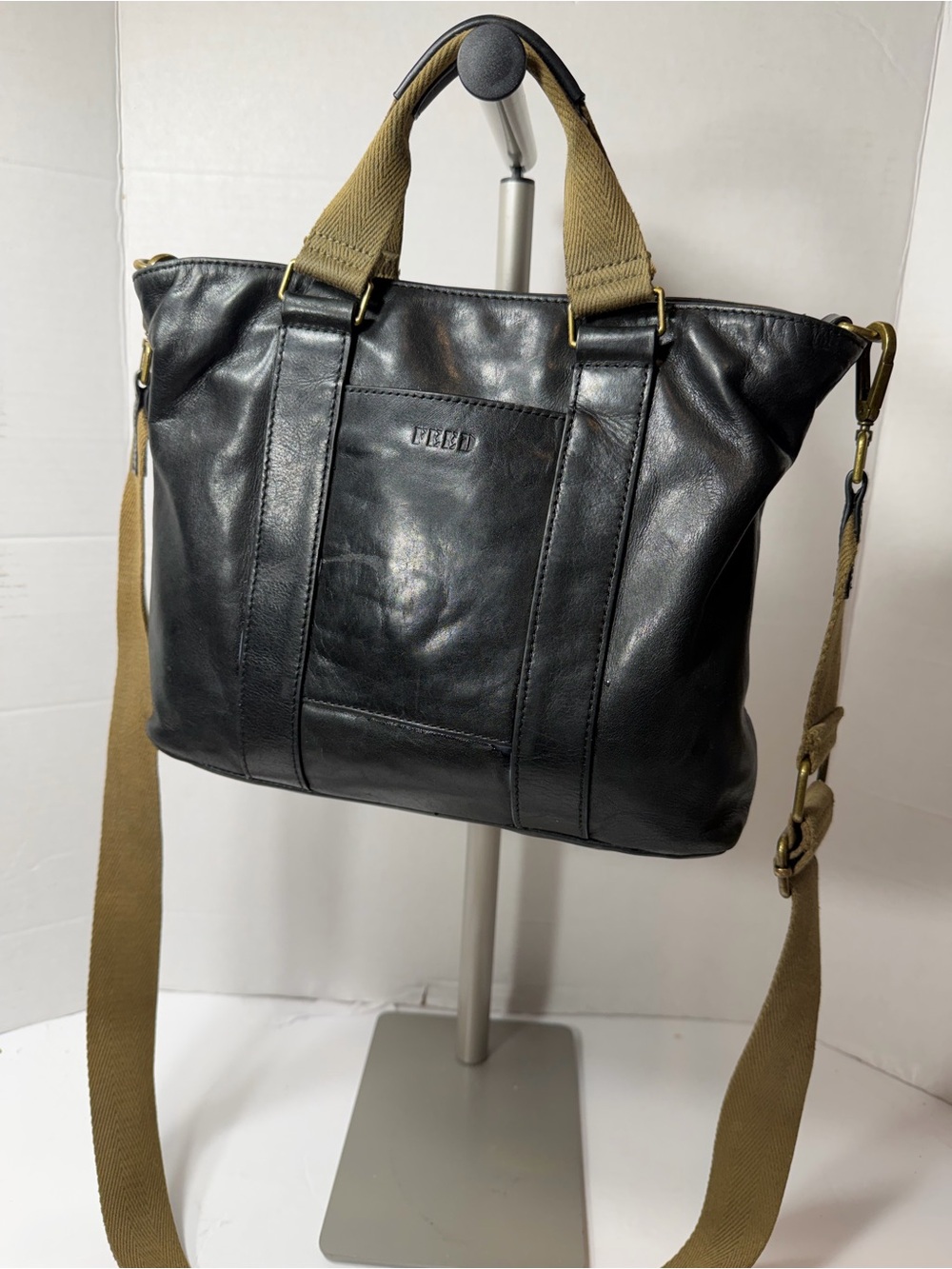 FEED black mini hand bag with Tan Strap